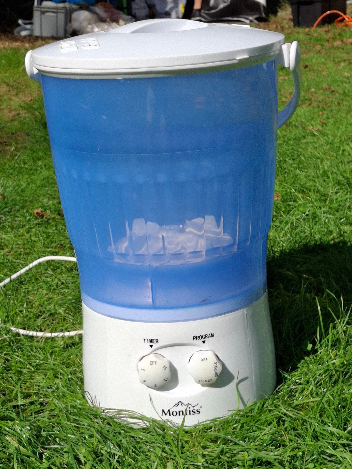 Montiss Mini Wasmachine, Ophalen