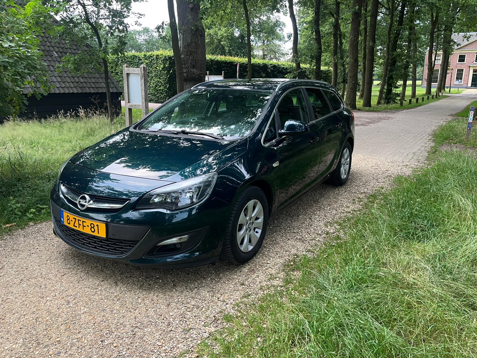 Opel Astra 1.4 Turbo 103KW ST 2014 Groen mooie staat 5750€, Auto's, Opel, Voorwielaandrijving, Zwart, 4 cilinders, Leder en Stof
