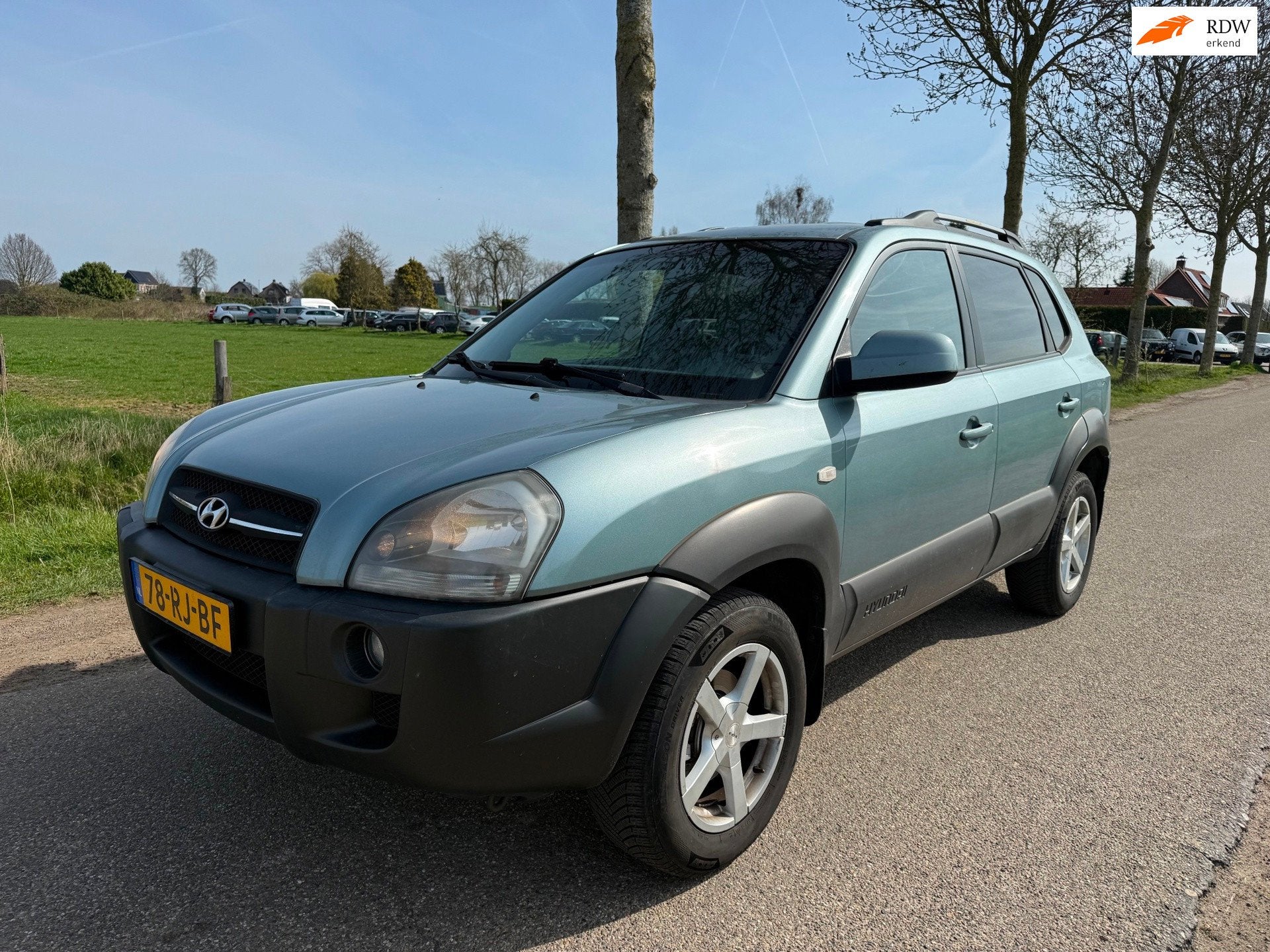 Hyundai Tucson 2.0i Dynamic Airco/Trekhaak, Auto's, Stof, Gebruikt, 4 cilinders, Origineel Nederlands