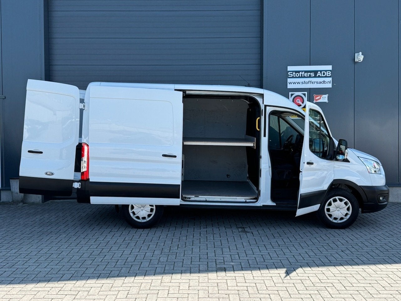 Ford Transit 350 2.0 TDCI 130pk L2H2 Trend MHEV | Camera | T, Stof, 4 cilinders, 2500 kg, Wit
