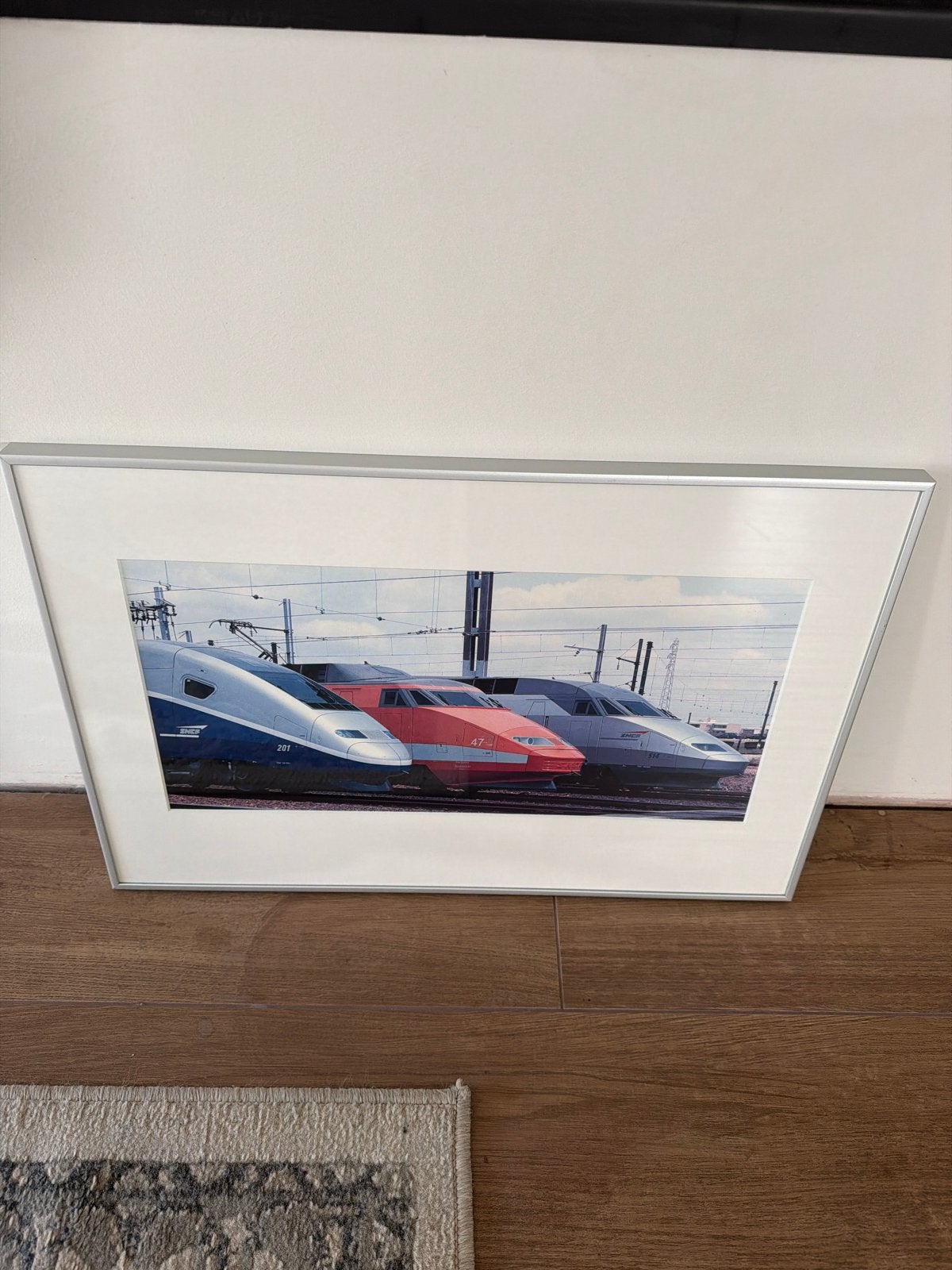 Ingelijste foto van TGV-treinen, Ophalen