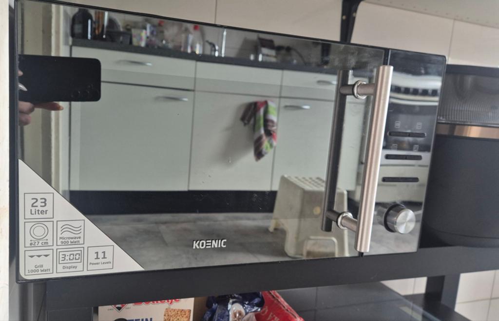 Koenic Combimagnetron 23L - Zwart met Grillfunctie, Witgoed en Apparatuur, Magnetrons, Ophalen, Combimagnetron, Grill, Zo goed als nieuw