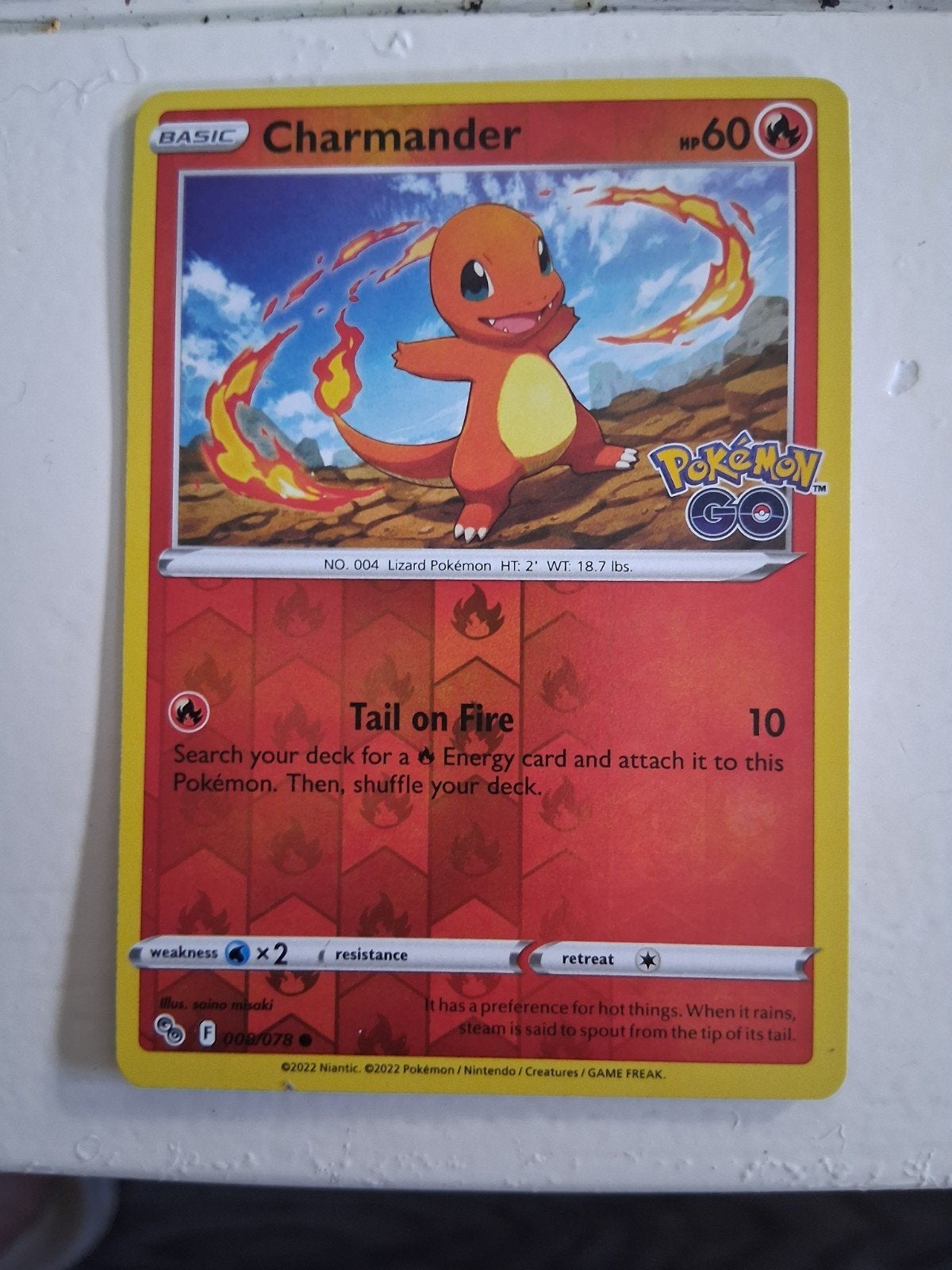 Pokémon GO Charmander kaart - Basic, 60 HP, Ophalen of Verzenden, Zo goed als nieuw, Losse kaart