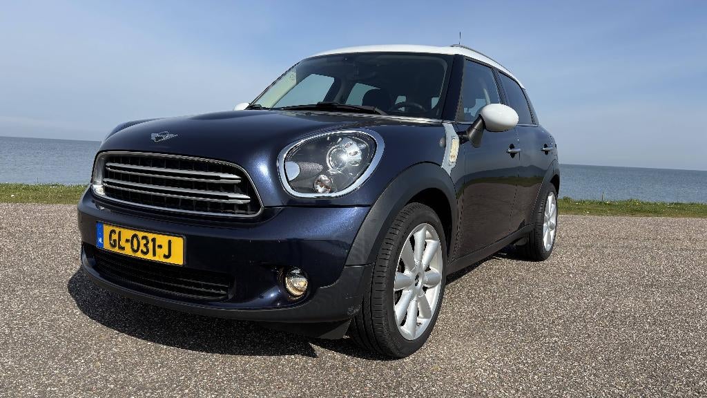 Mini Countryman 1.6 Cooper AUT 2015 Blauw, Auto's, Stof, Zwart, Blauw, 122 pk