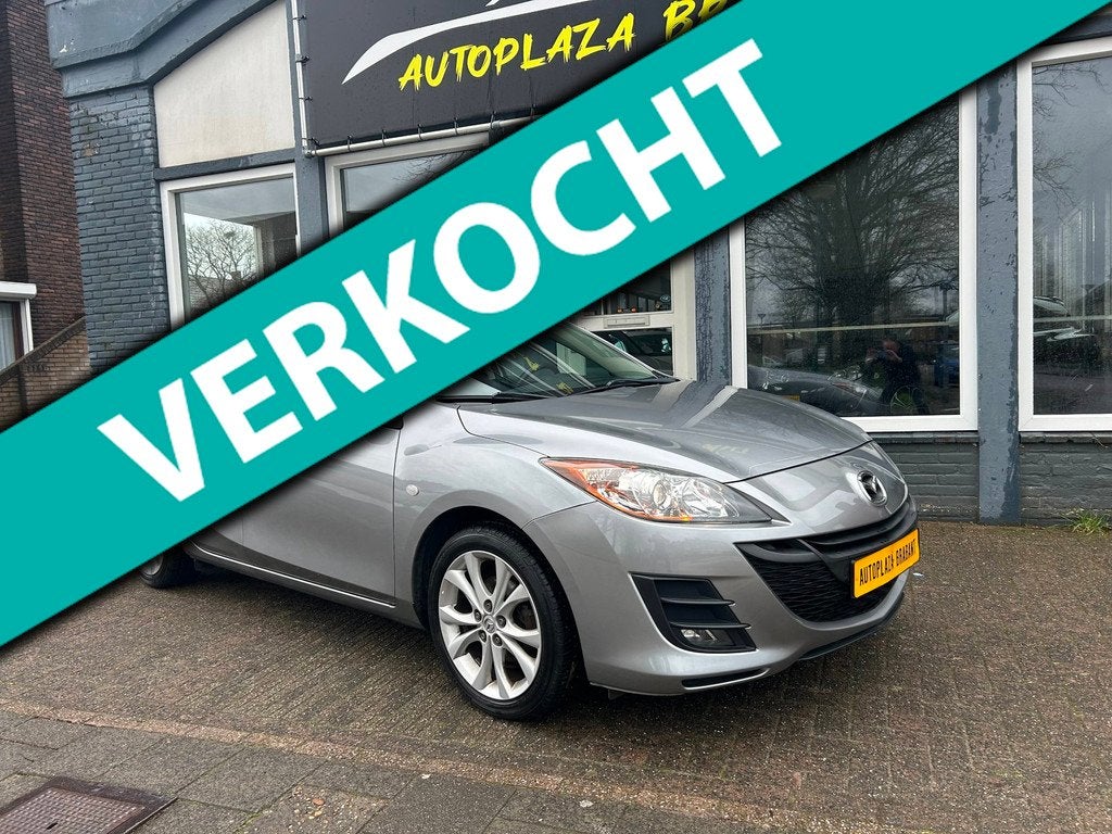Mazda 3 1.6 S / NAVI/ AIRCO/ PDC/ CRUISE/ XENON/ 16 INCH/ AU, Voorwielaandrijving, Stof, Gebruikt, Zwart