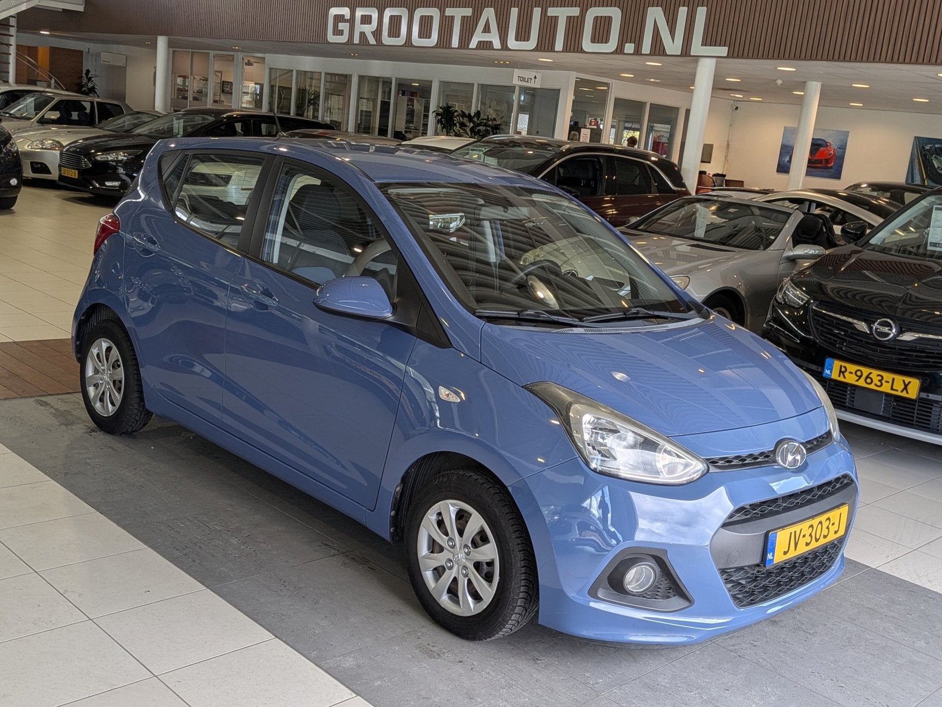 Hyundai i10 1.0i i-Motion Comfort Dealer Onderhouden, Cruise, Auto's, Voorwielaandrijving, Stof, Gebruikt, Euro 6