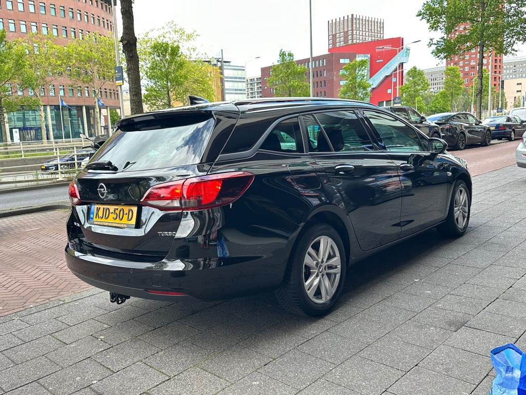 Opel Astra Sports Tourer 1.4 Business+ Automaat Airco Navi C, Auto's, Opel, Stof, Gebruikt, Euro 6, 150 pk
