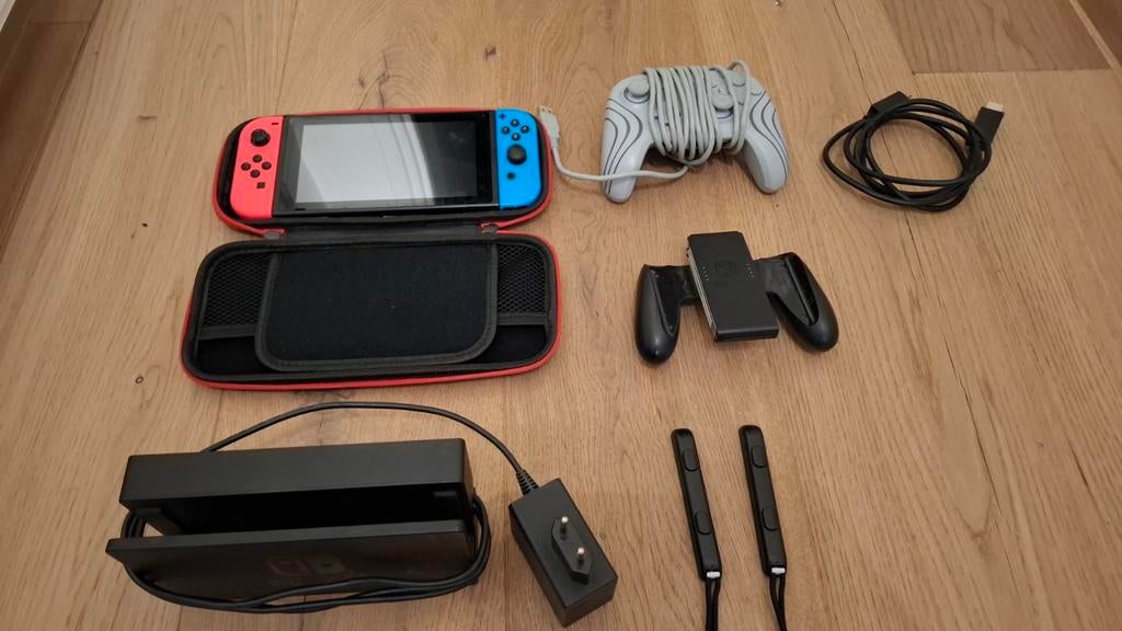 Nintendo Switch met defecte Joy-Cons (rood en blauw), Overige genres, 1 speler, Refurbished, Ophalen of Verzenden