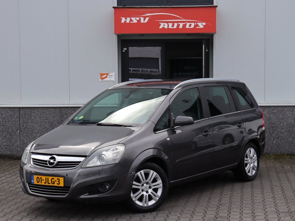Opel Zafira 1.8 Cosmo 7-pers navi 1/2 Leer airco org NL, Auto's, Opel, Gebruikt, 4 cilinders, Zafira, Zilver of Grijs