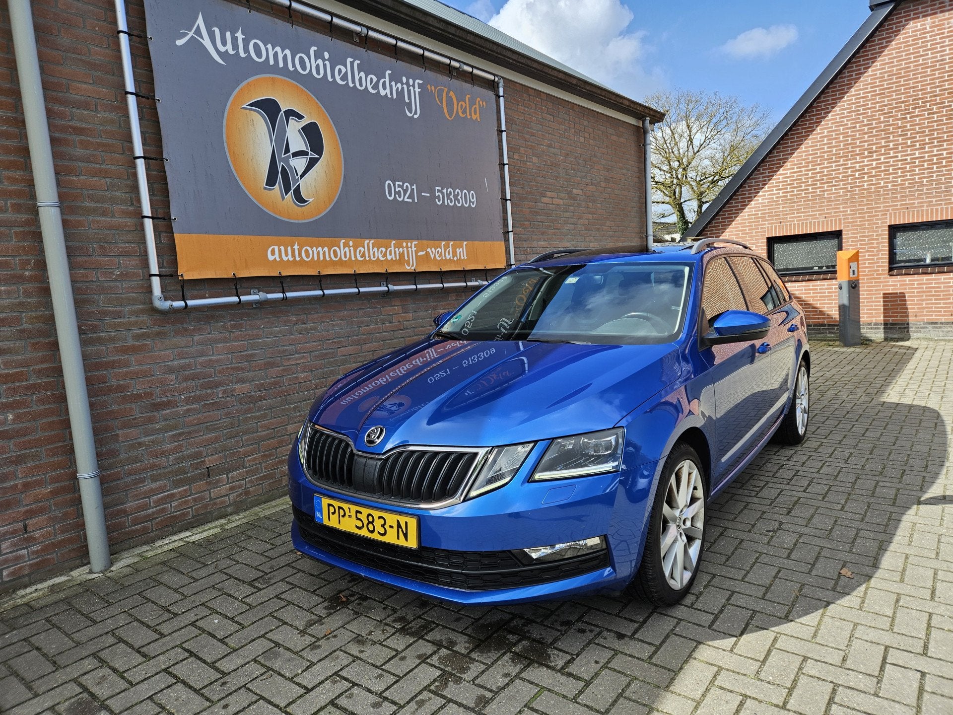 Skoda Octavia Combi 1.0 TSI Greentech Ambition Business, Auto's, Skoda, Stof, Parkeersensor, Blauw, 116 pk