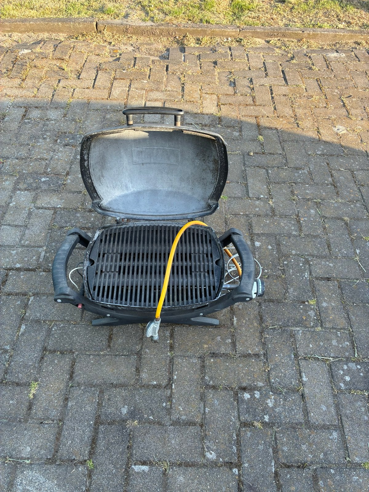 Weber Q1000 gasbarbecue met gasfles, Ophalen of Verzenden, Gebruikt