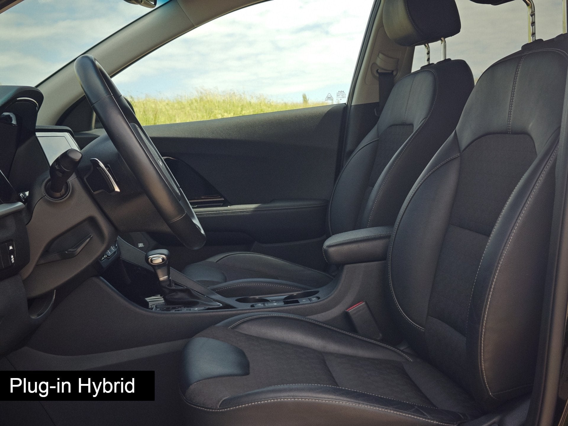 Kia Niro 1.6 GDi PHEV DynamicLine (bj 2022, automaat), Gebruikt, Zwart, Leder en Stof, Zwart