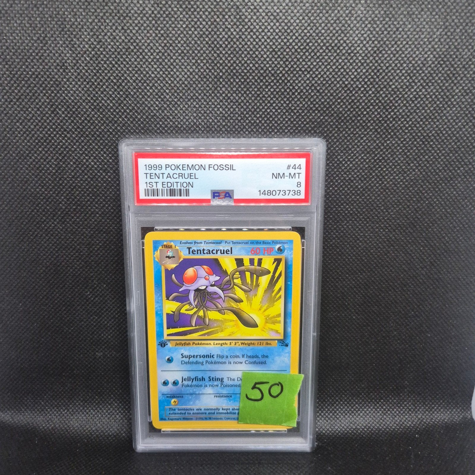 Tentacruel 1st Edition Fossil PSA 8, Ophalen of Verzenden, Zo goed als nieuw