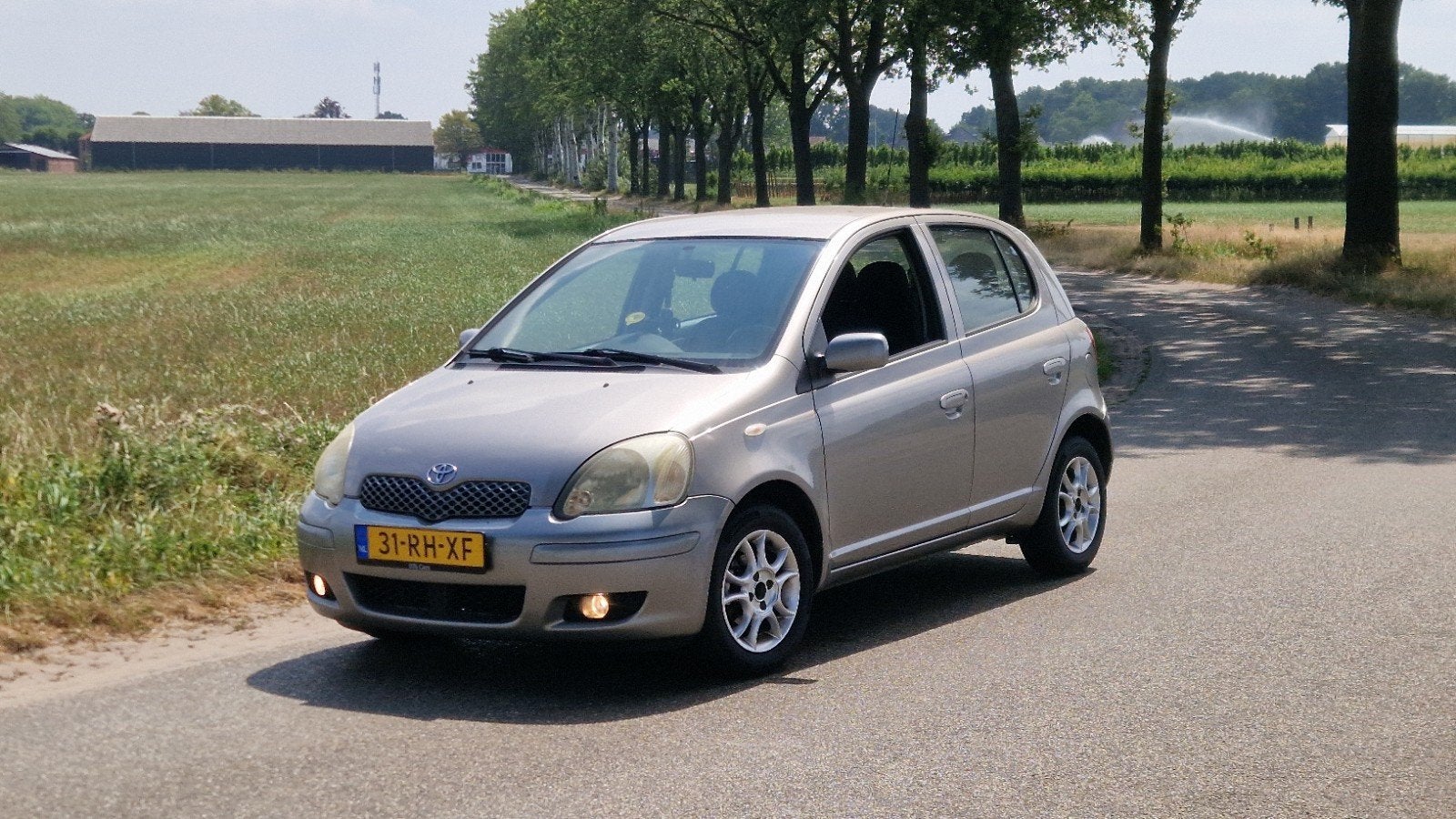 Toyota Yaris 1.3 16V Vvti 5DR 2005 Grijs, Auto's, Toyota, Bedrijf, Yaris, ABS, Airconditioning, Isofix, Lichtmetalen velgen, Mistlampen