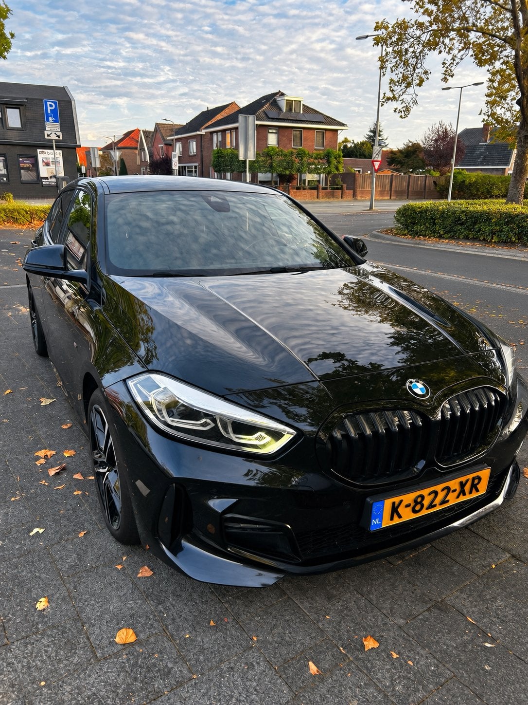BMW 1-Serie 118i 140pk Aut 2020 Zwart, Achterwielaandrijving, Leder en Stof, Zwart, Verwarmde buitenspiegels