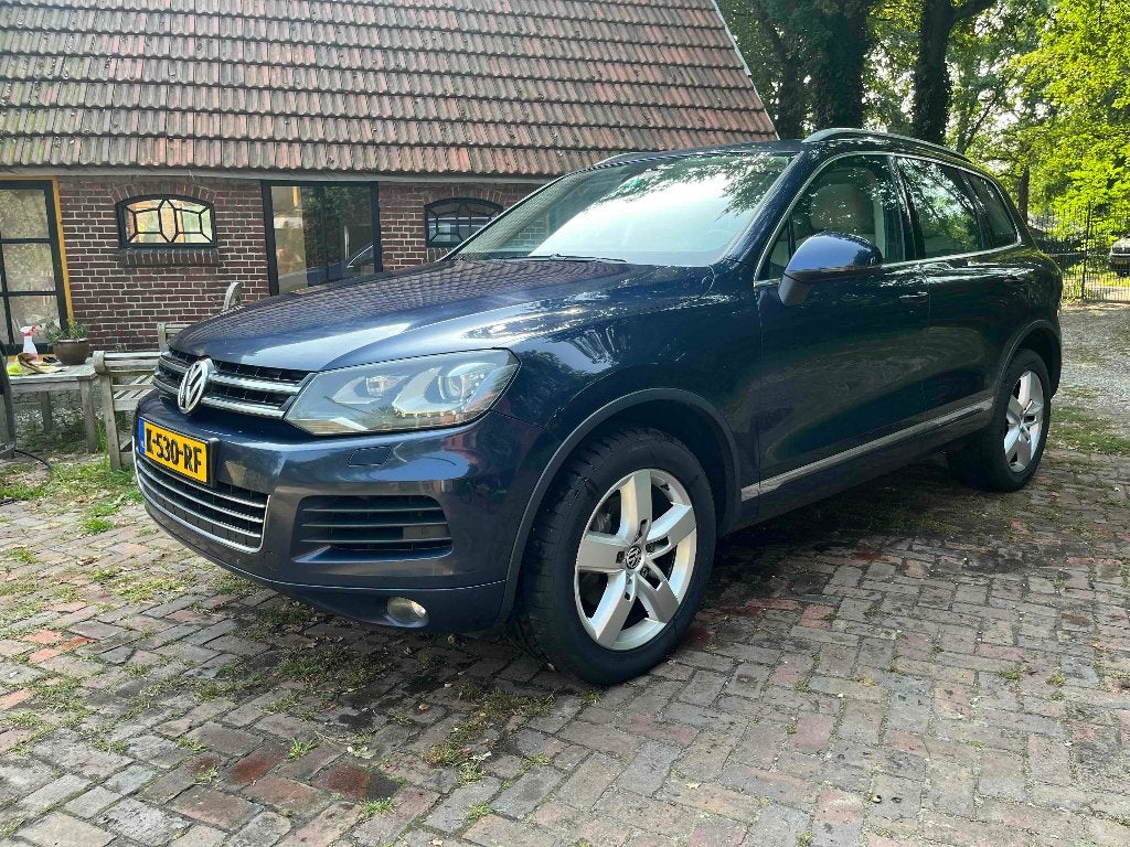 VW Touareg 2012 Blauw, Auto's, Automaat, Dealer onderhouden, 2199 kg, Beige