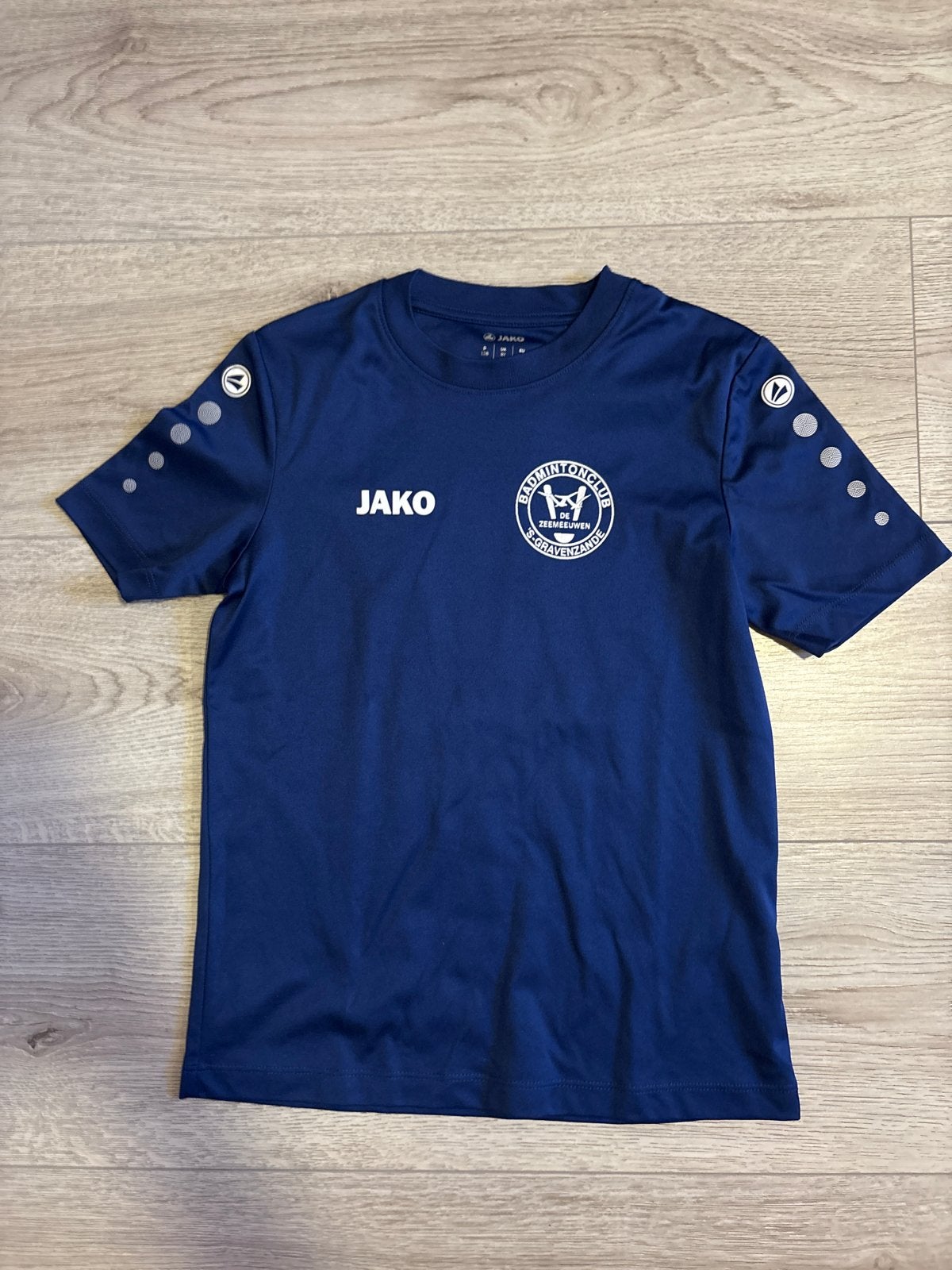 Badmintonclub Zeemeeuwen T-shirt - Maat 128, Ophalen, Zo goed als nieuw, Jongen of Meisje, Sport- of Zwemkleding