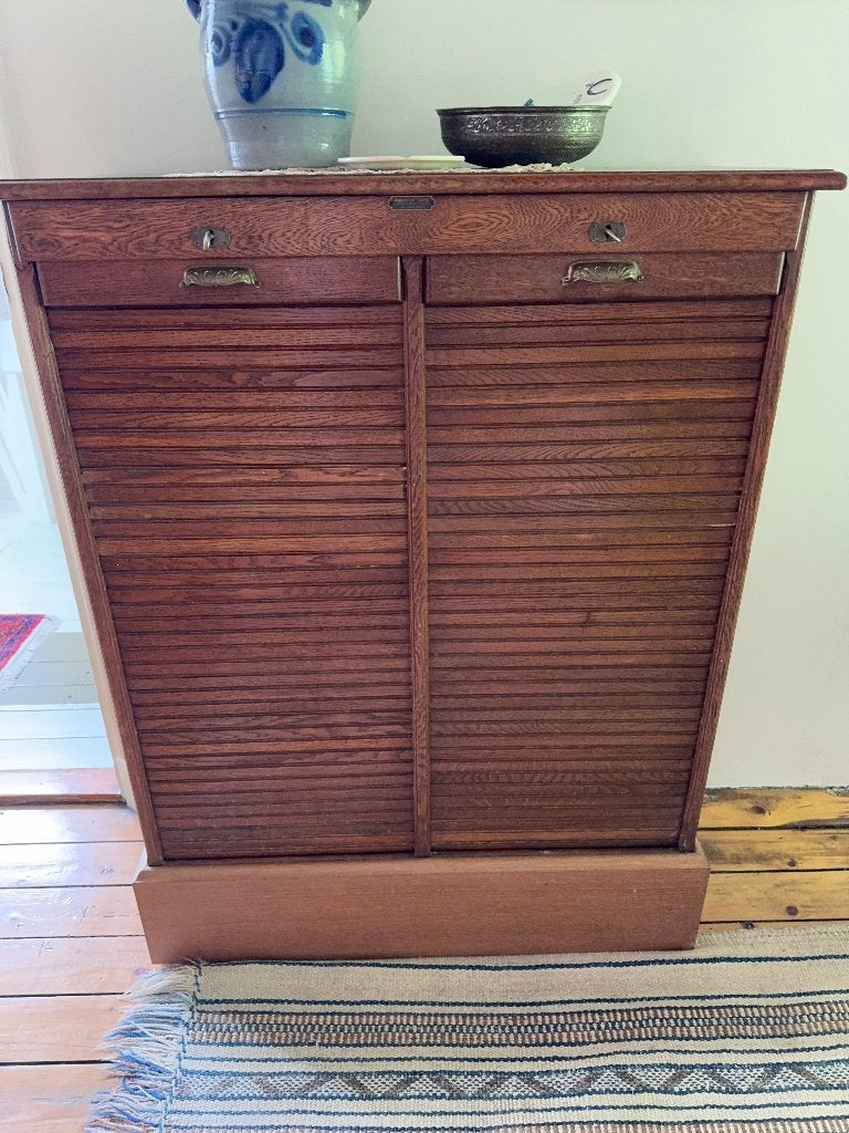 Antieke ladenkast met roldeurtjes, Ophalen