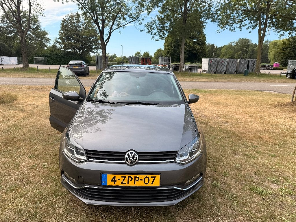 Volkswagen Polo 1.2 TSI 66KW 2014 Grijs, Auto's, Volkswagen, Euro 5, Stof, 40 €/maand, Zwart