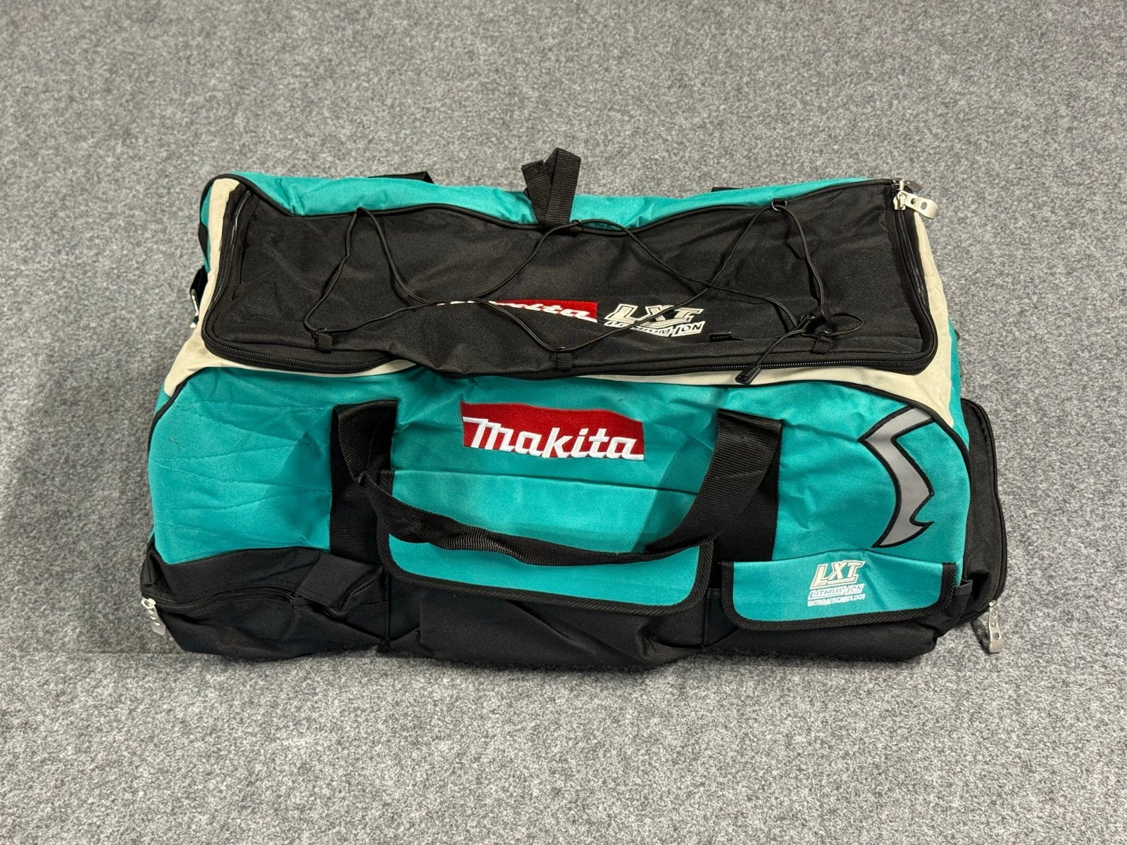 Nieuwe Makita Gereedschapstas / Reistas / Trolley, Uitschuifbare handgreep, 30 cm of meer, Nieuw, Ophalen of Verzenden