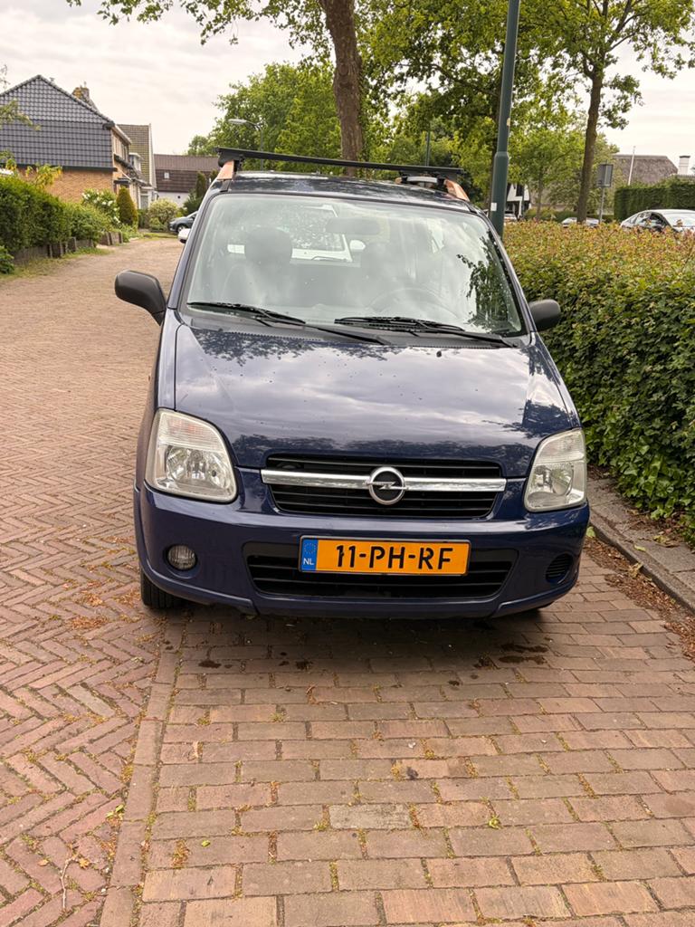 Opel Agila 1.0 2004 Blauw, Auto's, Voorwielaandrijving, 31 €/maand, Blauw, Origineel Nederlands