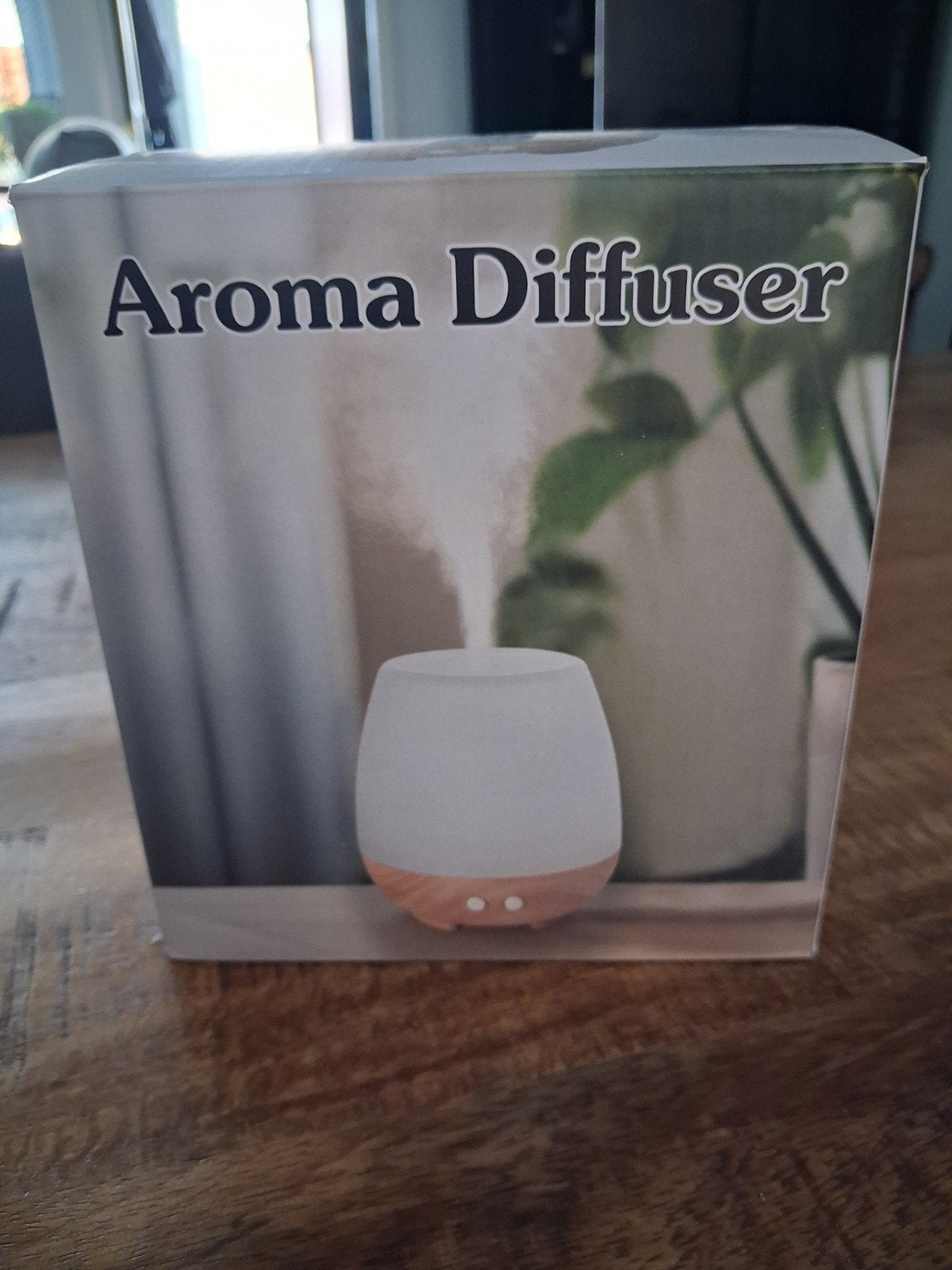 Aroma Diffuser met 6 kleuren LED en essentiële oliën, Ophalen