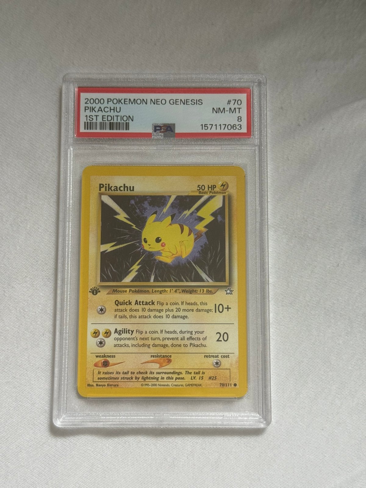 Pikachu Neo Genesis #70 PSA 8 - 1st Edition 2000, Ophalen of Verzenden, Zo goed als nieuw