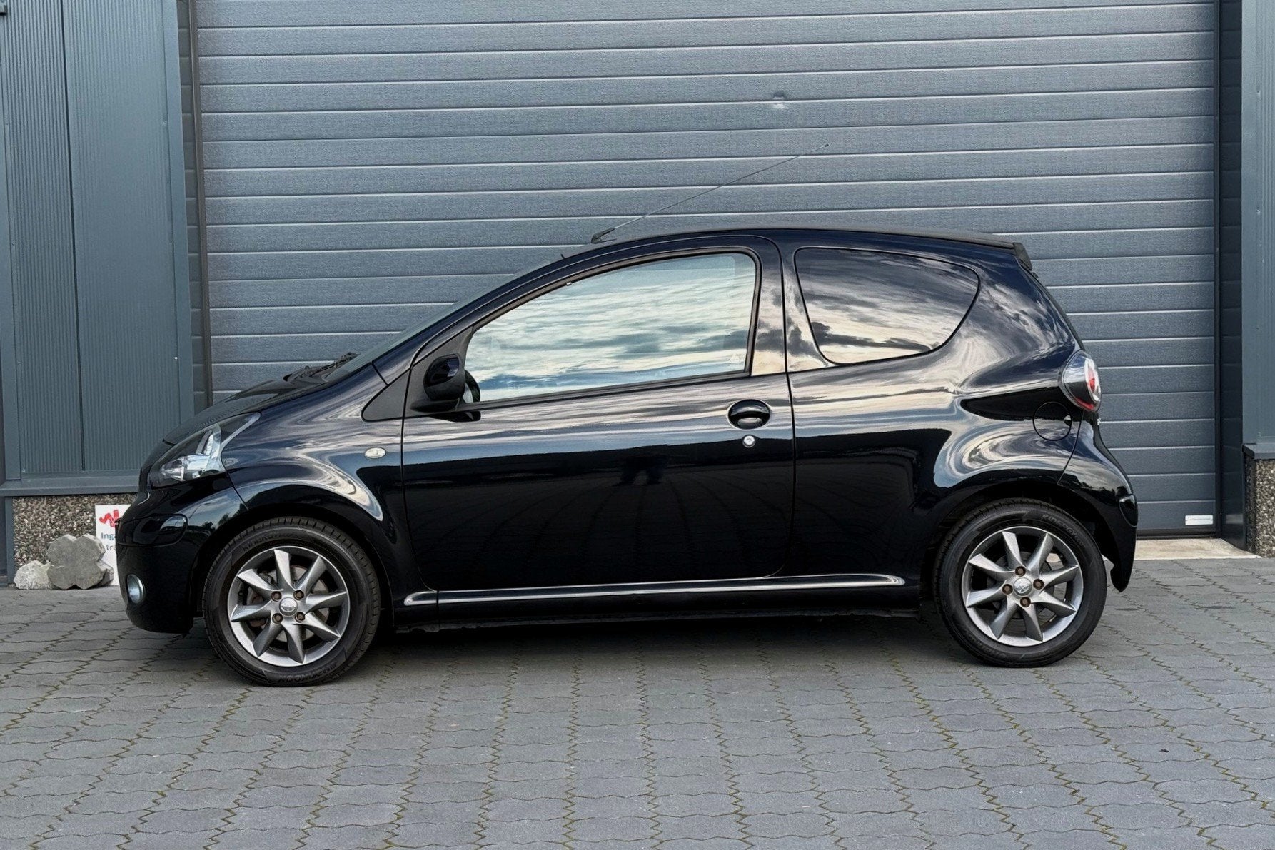 Toyota Aygo 1.0-12V Dynamic Navigator AIRCO NAVI LMV 2e eig., Voorwielaandrijving, Stof, Gebruikt, Zwart