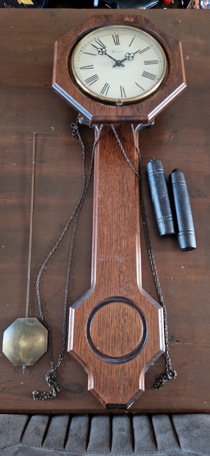Complete eikenhouten Warmink (Wuba) wandklok, Ophalen