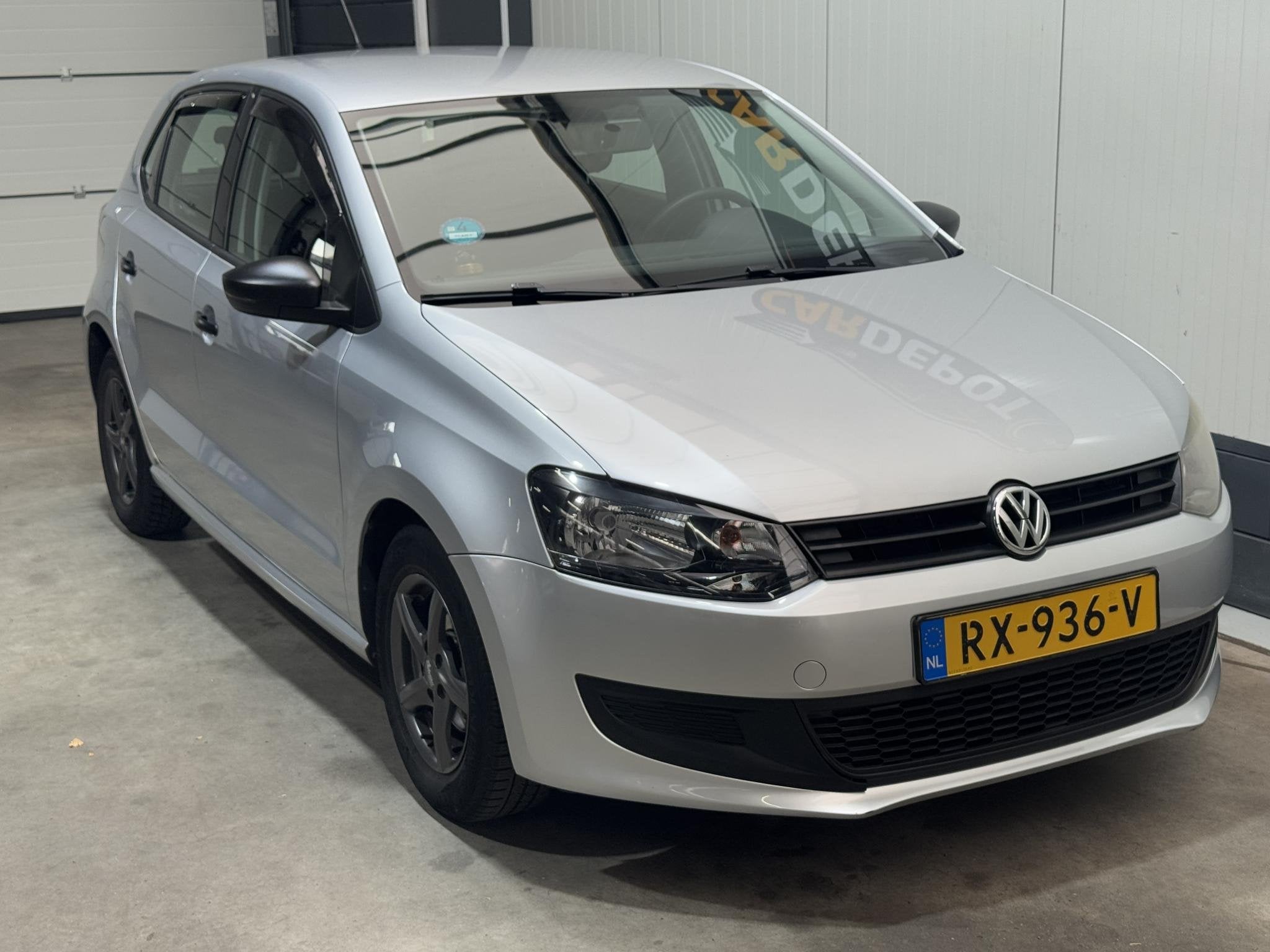 Volkswagen Polo 1.2-12V Comfortline, Auto's, Voorwielaandrijving, Euro 5, Zwart, 1198 cc