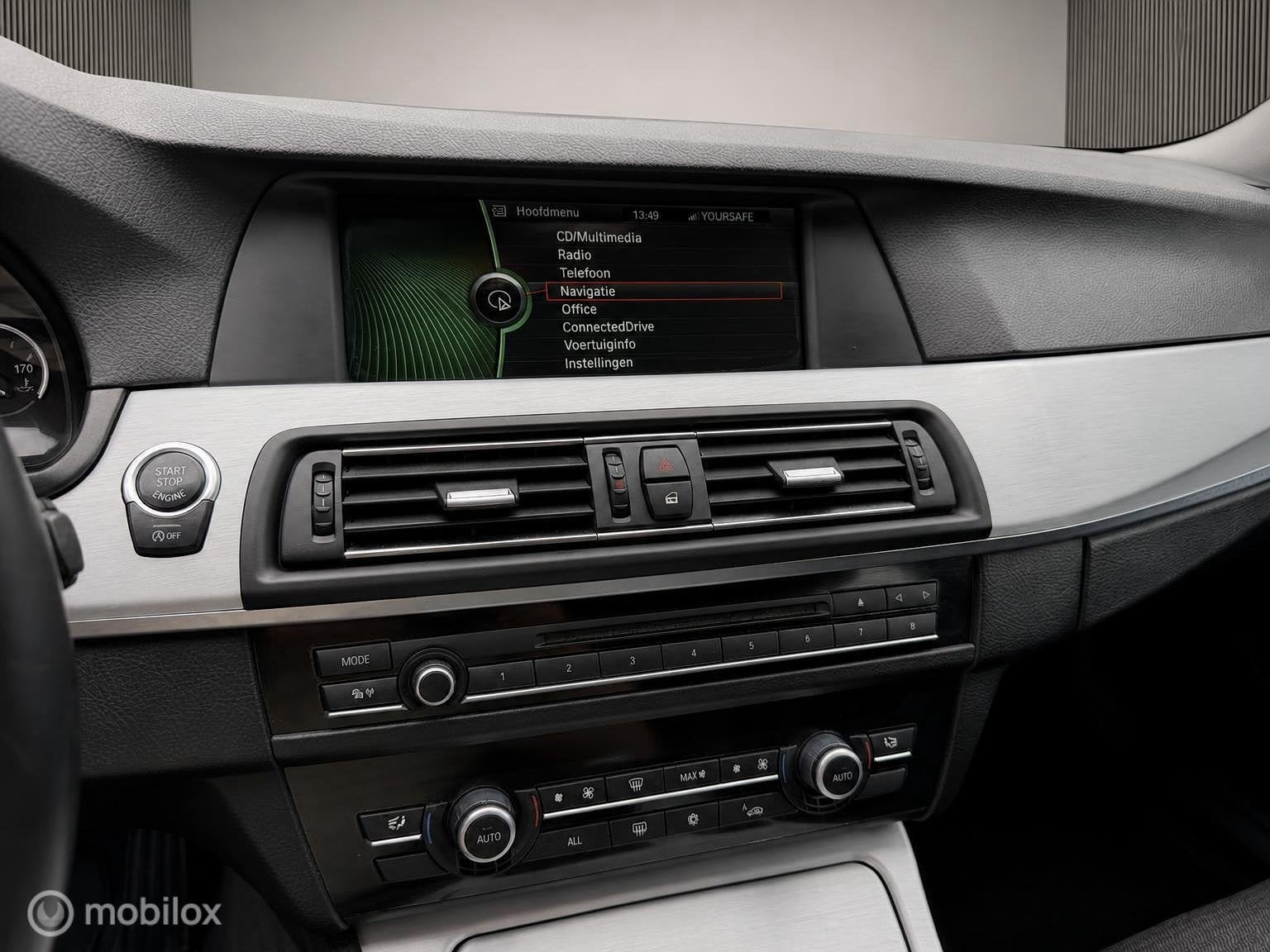 Foto 13 van BMW 5-serie Touring 520i High Executive