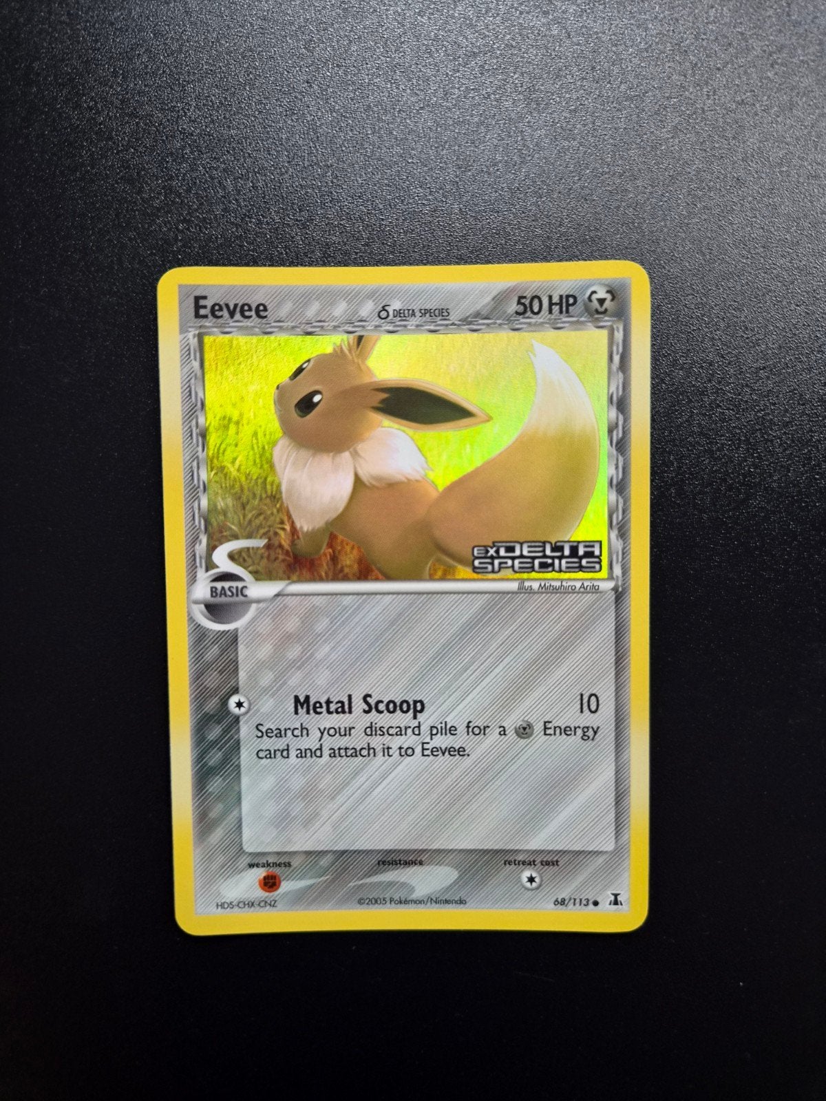 Eevee 68/113 Pokemon Delta Species Stamped, Ophalen of Verzenden, Zo goed als nieuw, Booster, Foil