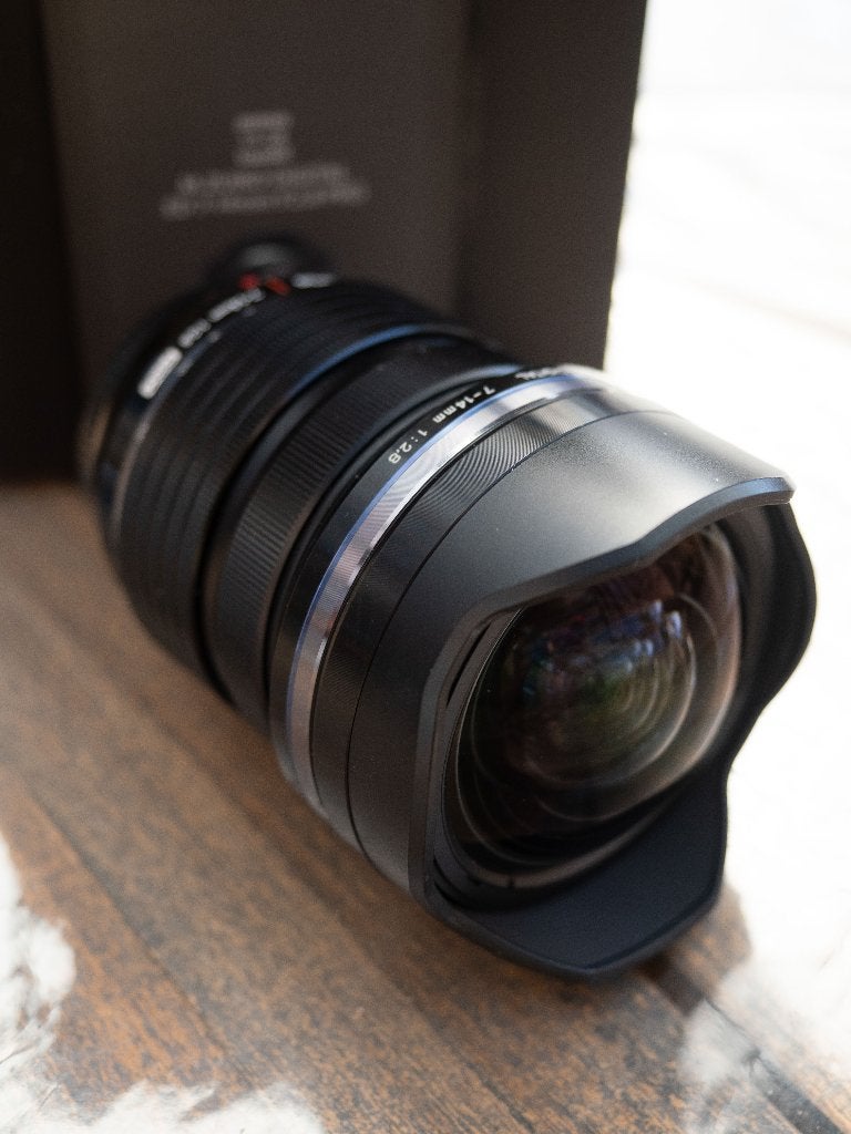 Olympus Groothoeklens 7-14 mm 1:2.8 Pro+polarisatie filter, Audio, Tv en Foto, Fotografie | Lenzen en Objectieven, Ophalen of Verzenden