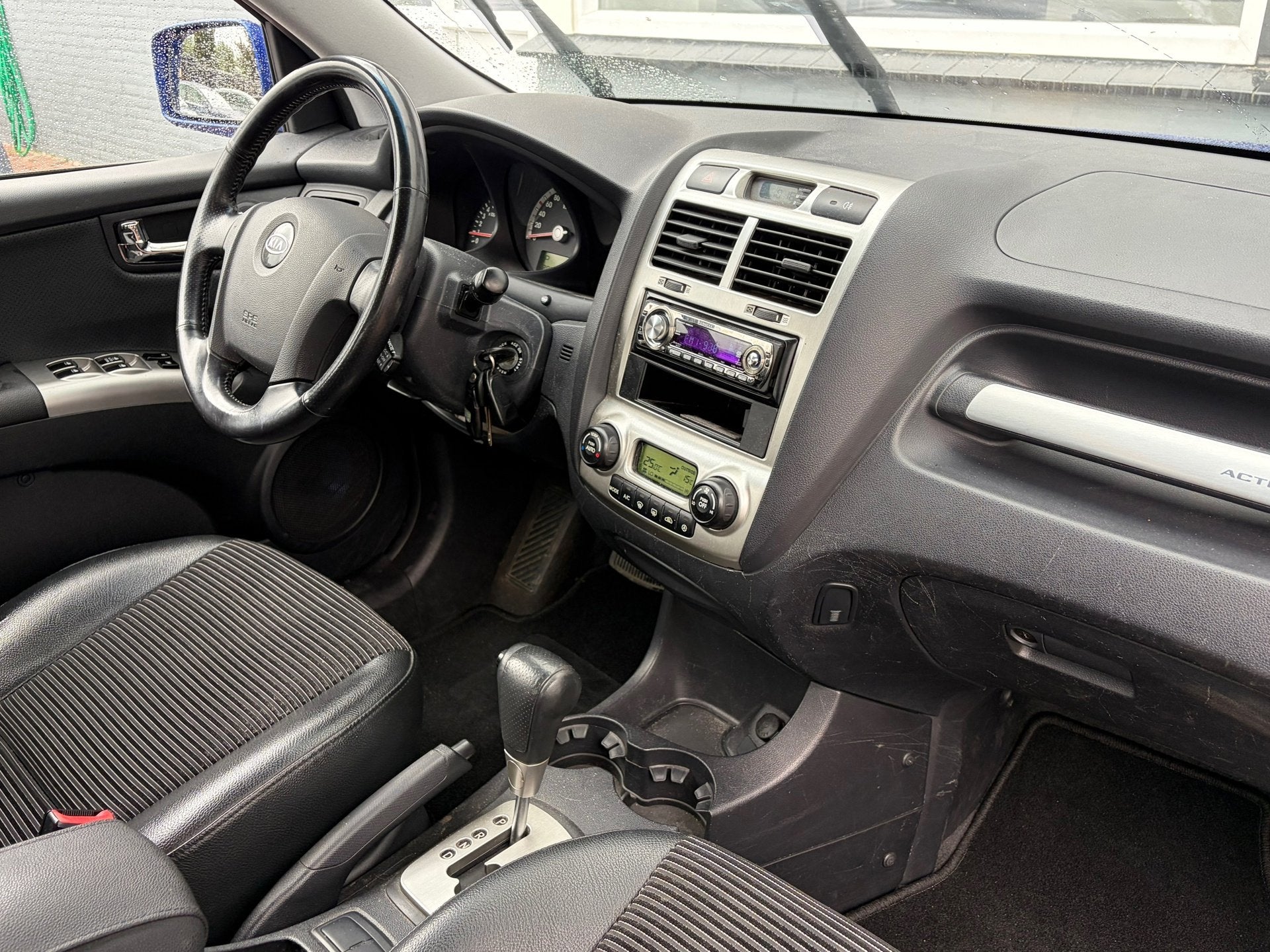 Kia Sportage 2.7 V6 Adventure 4WD / Automaat / APK, Automaat, Automatische klimaatregeling, Gebruikt, Blauw