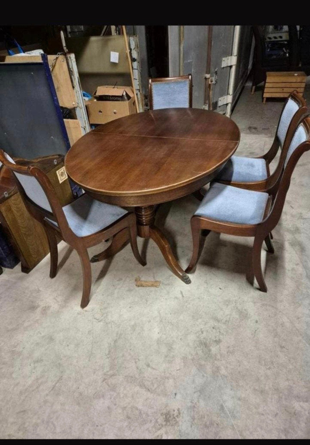 4 stoelen en ovale uitschuifbare tafel, Ophalen
