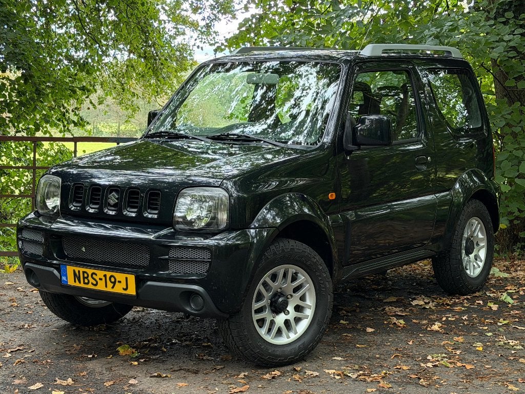 Suzuki Jimny Black & White Edition | 2009 | Airco | € 11.950, Auto's, Stof, Zwart, 4 stoelen, Zwart