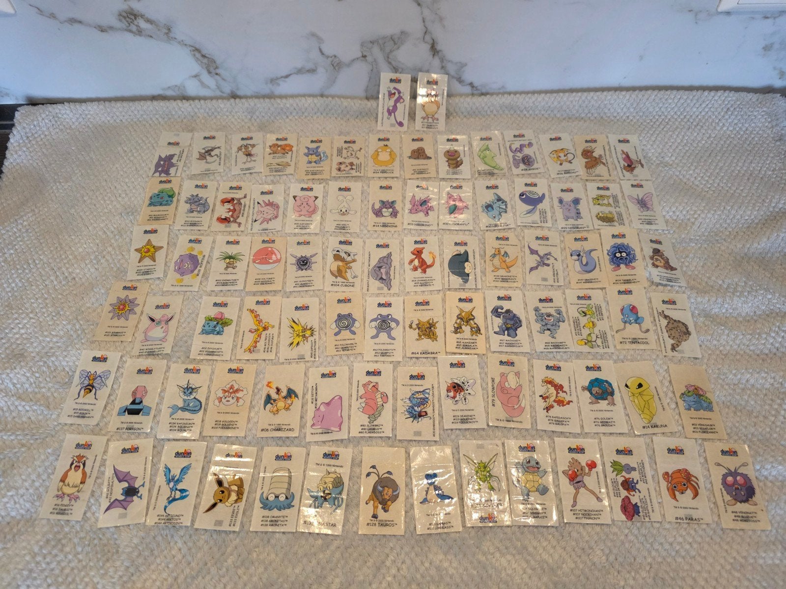 85x Vintage Pokémon Dunkin stickers 1999/2000, Ophalen of Verzenden, Gebruikt