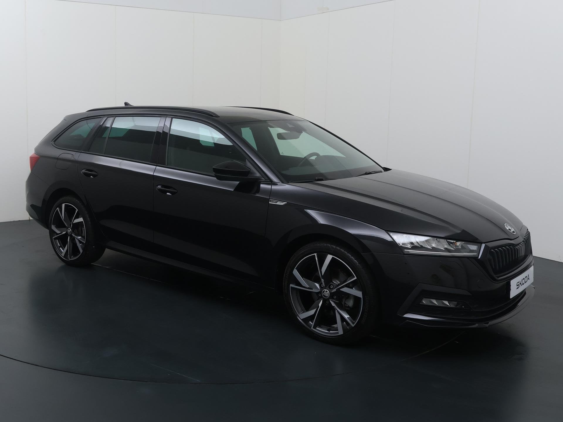 Skoda Octavia Combi 1.4 TSI iV PHEV Sportline Business | 204, Auto's, 12 maanden, Stof, Gebruikt, 4 cilinders