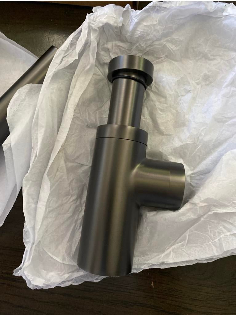 Damixa sifon met always open plug gunmetal, Huis en Inrichting, Badkamer | Badkamermeubels, Overige typen, Nieuw, Minder dan 100 cm