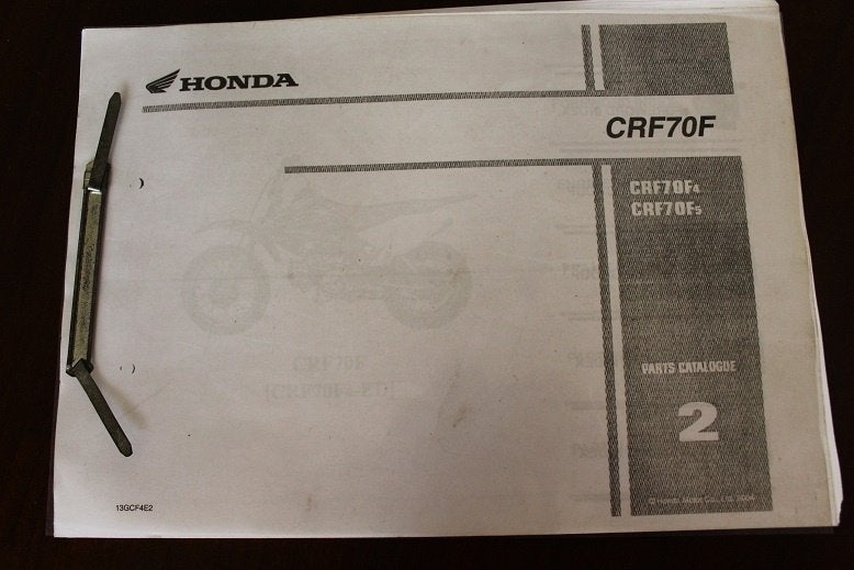 Honda CRF70F 2004 motorcycle parts catalogue CRF70, Ophalen of Verzenden, Honda