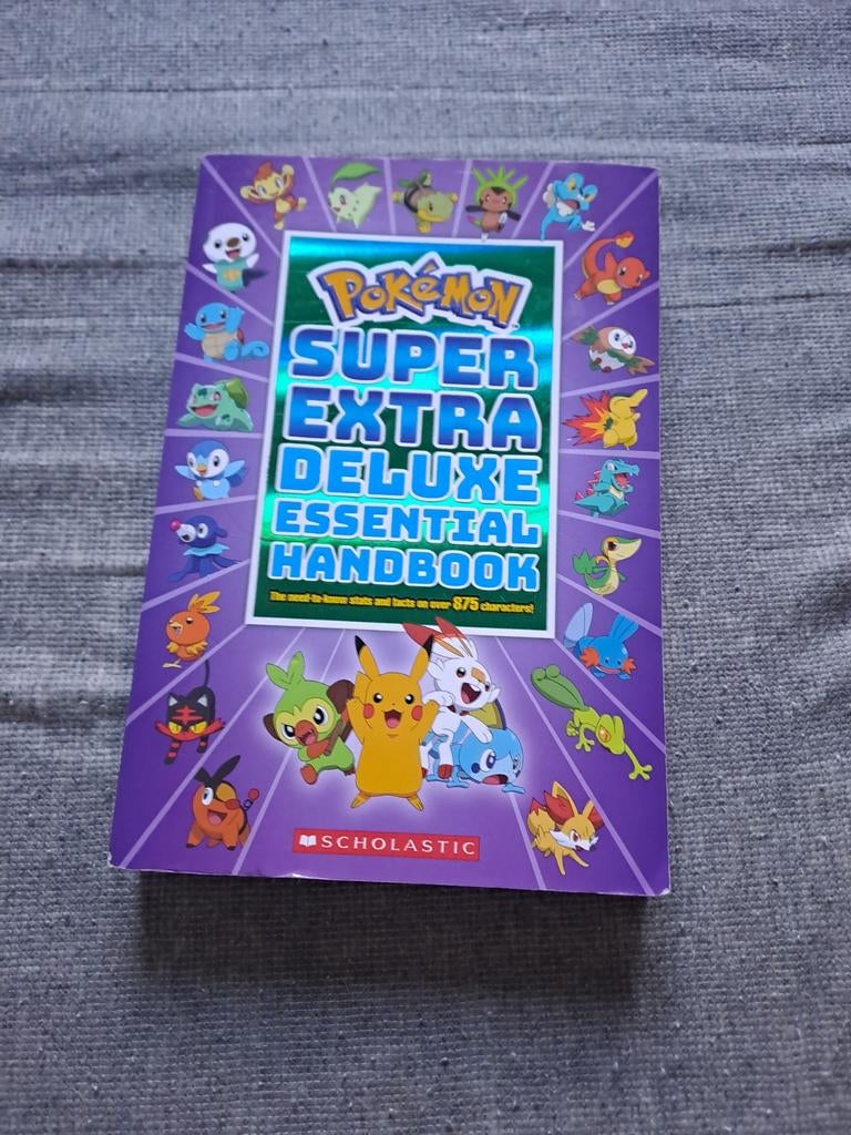 Scholastic - Pokemon: Super Extra Deluxe Essential Handbook, Boeken, Ophalen of Verzenden, Zo goed als nieuw, Scholastic