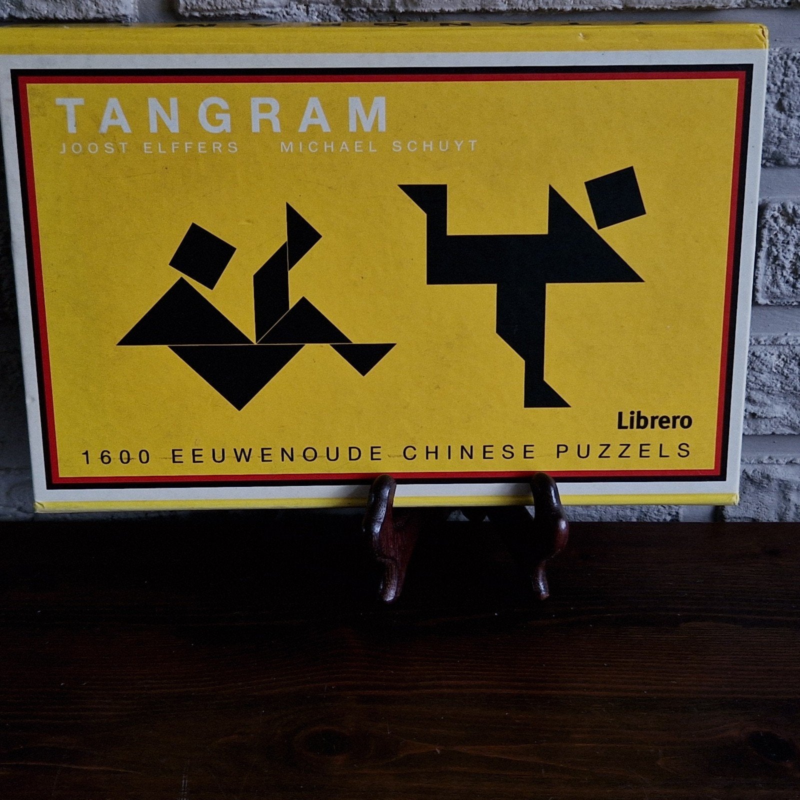 Tangram: Een bedrieglijk eenvoudige Chinese puzzel ' Librero, Ophalen of Verzenden, Minder dan 500 stukjes, Zo goed als nieuw