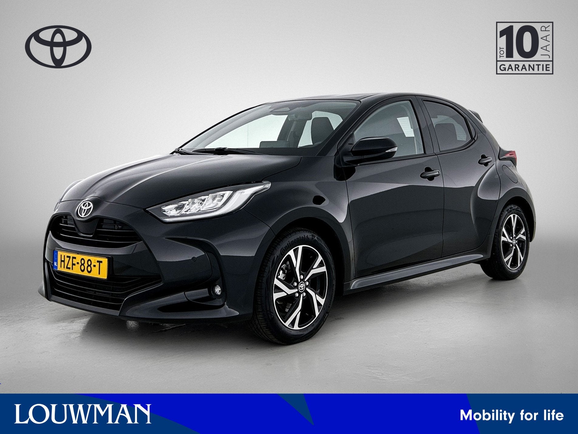 Toyota Yaris 1.5 Hybrid 115 Dynamic Comfort Pack | BTW voert, Gebruikt, Automatische klimaatregeling, Zwart, Hybride Elektrisch/Benzine