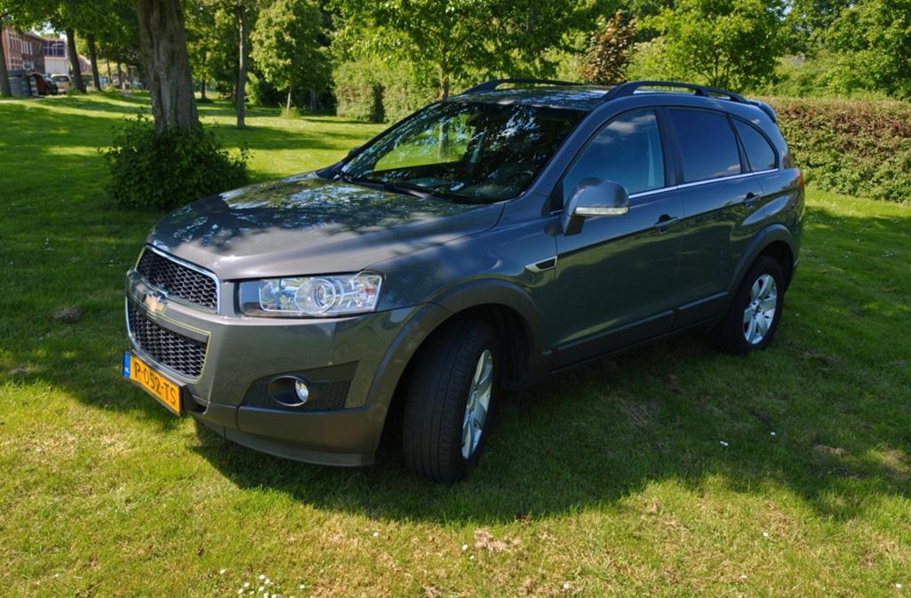 Chevrolet Captiva 2.4 2WD 2012 Grijs, Auto's, Chevrolet, Voorwielaandrijving, 1733 kg, Zwart, 4 cilinders