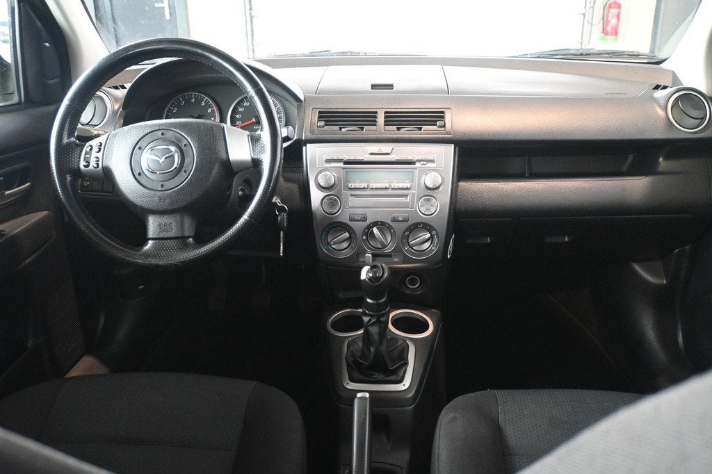 Mazda 2 1.4 Sportive Airco Trekhaak All in Prijs! Inruil Mog, Auto's, Voorwielaandrijving, 1025 kg, Gebruikt, Zwart