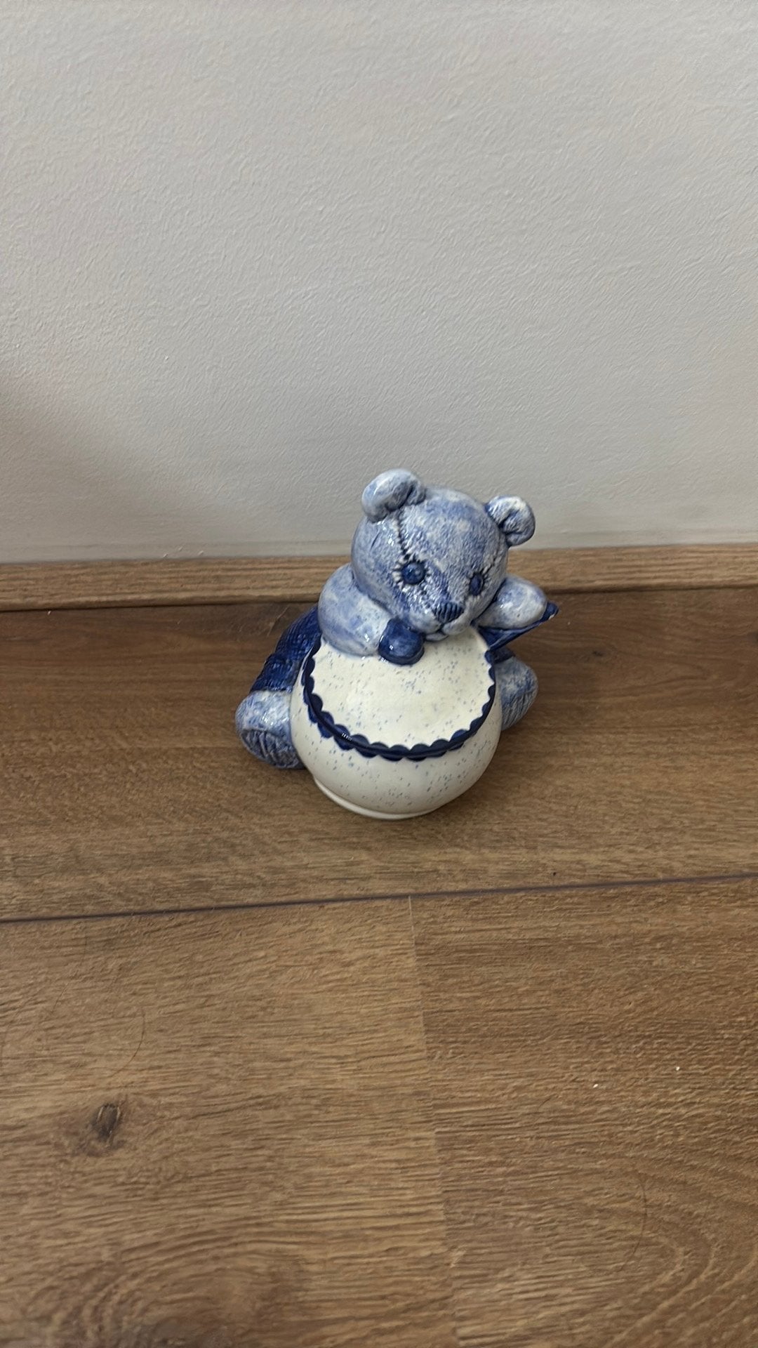 keramieken teddybeer-voorraadpot, Ophalen