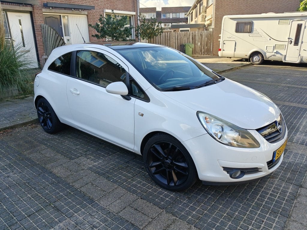 Opel Corsa 1.4 16V 3D AUT 2010 Wit, Auto's, Automaat, Stof, 4 cilinders, 100 pk
