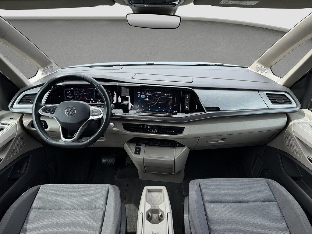 Volkswagen Multivan 1.5 eHybrid L2 Lang | Pano | Trekhaak |, Auto's, Volkswagen, Automaat, Stof, Zwart, 7 stoelen