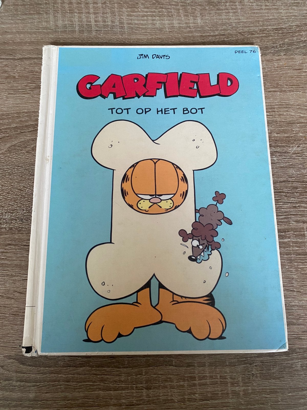 76 Garfield tot op het bot, Eén stripboek, Ophalen of Verzenden, Gelezen