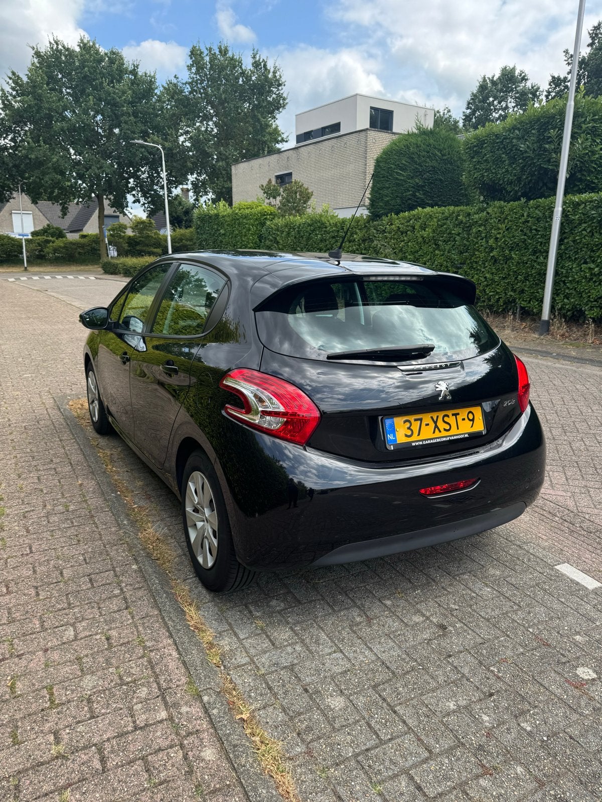 Peugeot 208 1.2 VTi 82PK 5D (102g) 2012 Zwart, Auto's, Peugeot, Voorwielaandrijving, 1199 cc, Zwart, Origineel Nederlands